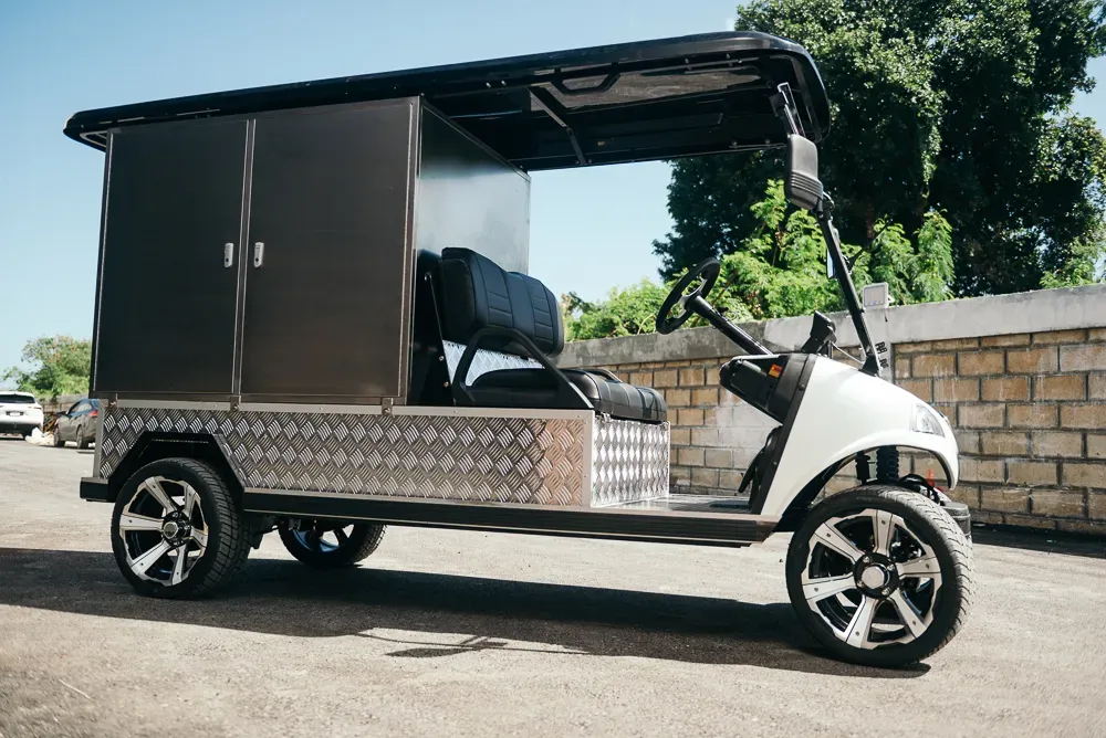 An electric cart undergoes golf cart maintenance through a professional inspection of tires, steering, and mechanical components.