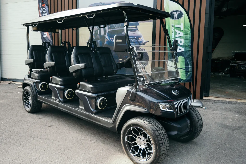 This cart shows the Top Benefits of Using Luxury Golf Carts for utility and commercial use, with ample cargo space.
