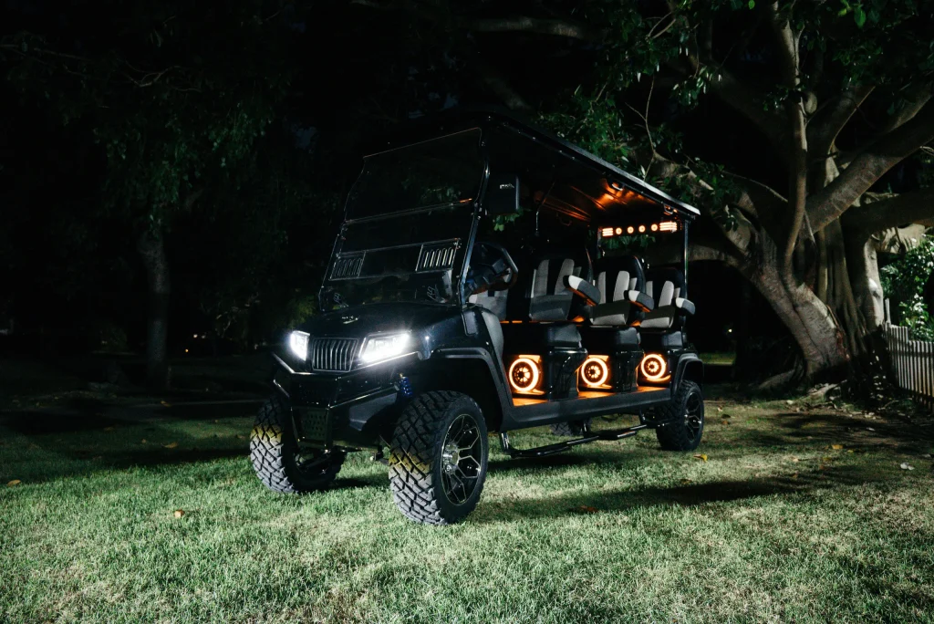 This image shows the Top Benefits of Using Luxury Golf Carts with spacious seating and custom lights, perfect for group transport.